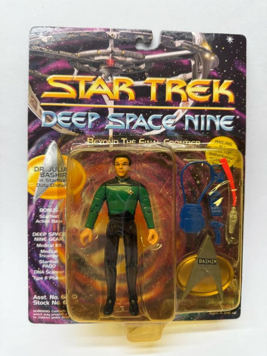 El doctor Julian Bashir con el uniforme de la Flota Estelar: australiano